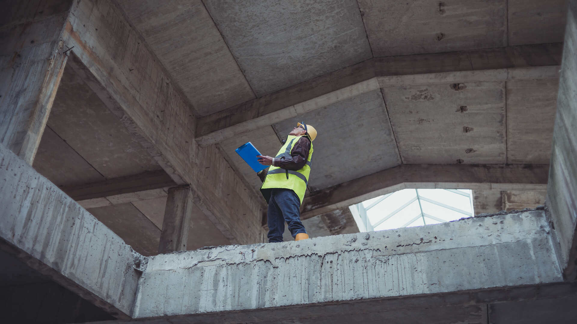 Man on concrete construction site