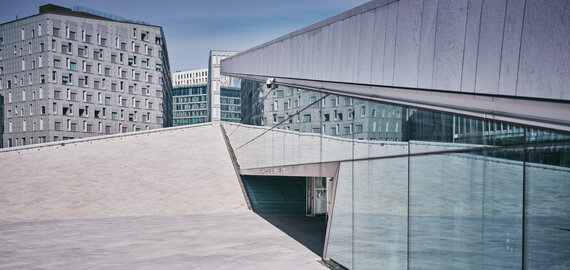 glass facade and concrete plaza