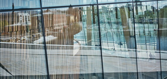 wood interior and city through glass window