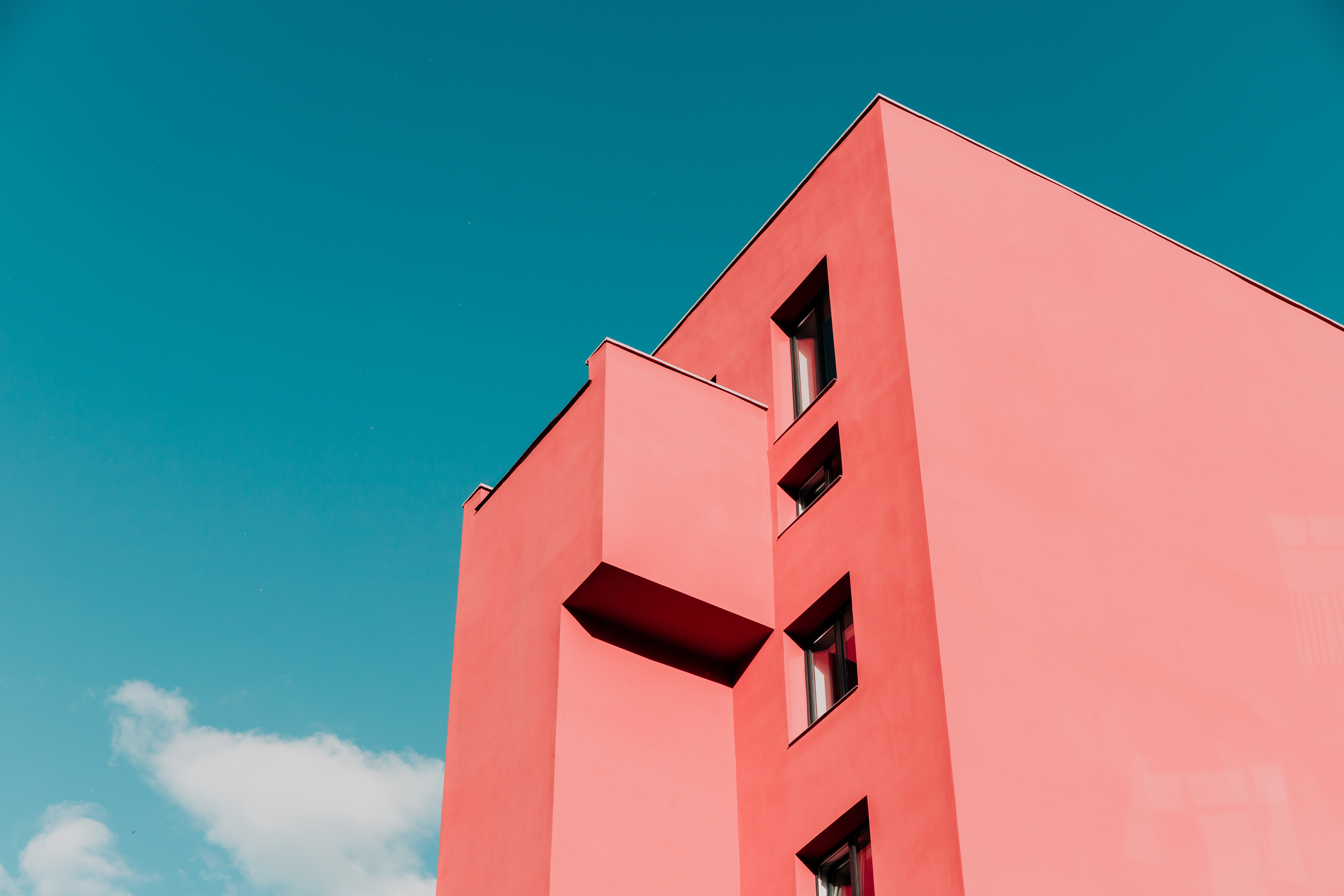 pink house blue sky
